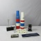 (25) Pieces Of Champion Spark Plug Collectibles - DR