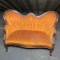 Antique Orange Upholstered Loveseat - A3