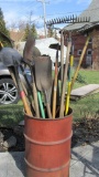 Garden Tools In Metal Barrel - G