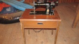 Singer Sewing Machine In Wood Cabinet - B