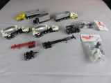 (12) HO Scale Semi Trucks With Trailers