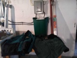 Basement- (2) Men's Coats, House Jack Post, Garbage can & Plastic roll