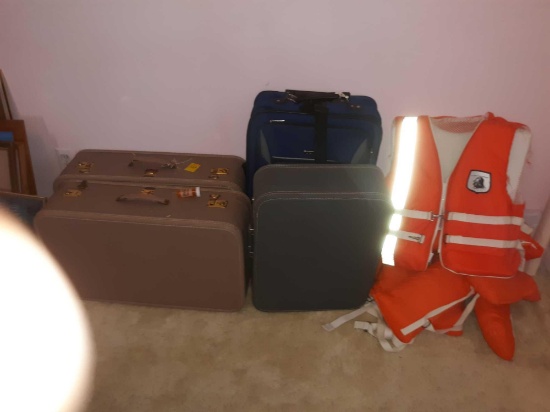 BB - Suitcases and lifejackets