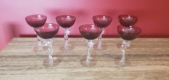D- Cranberry Glass with Female Figure Stems