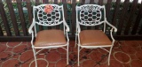 L- (2) White Painted Cast Iron Chairs with Cushions