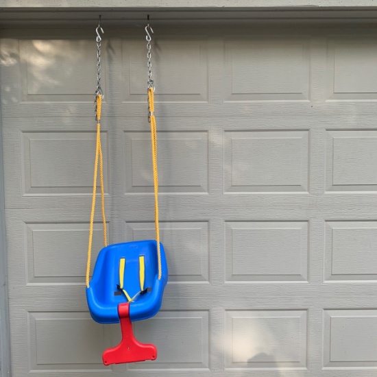 Plastic baby swing with hanging chains and hooks