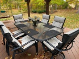 Outdoor Table with (6) total chairs, and cushions