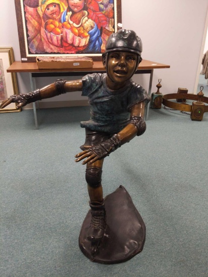 R1- Bronze Statue of Boy on Roller Blades