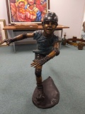 R1- Bronze Statue of Boy on Roller Blades