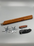 B- Numchucks, Pair of Chinese Throwing Stars, Pocket Knife, and Pocket Multi Tool