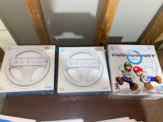 B- Mario Kart Wii and (3) Wii Wheels