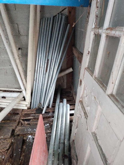 Outside- (2) Galvanized Round Fence Posts