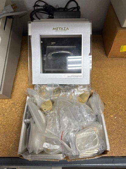 Metaza Roland Metal printer and Box of Mealions