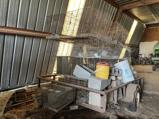 Hanging Rabbit Cages and Contents on Trailer