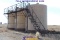 (3) Tank Battery Station Consisting of (3) 400-Bbl Upright Steel Tanks with Ladder & Stairs