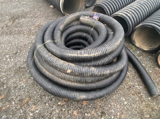 Roll of Black Drain Pipe