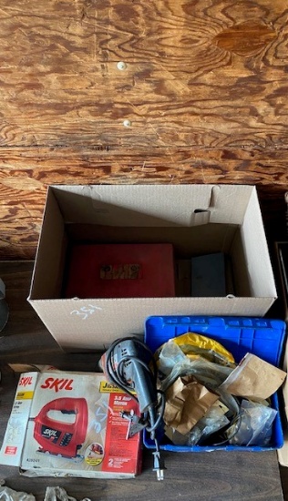 BOX OF SKIL ORINGS AND A DRILL