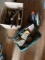 Skill Saw, Box of Tools and Sandpaper