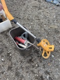 Grease Gun and Measuring Wheel