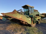 John Deere 7700 Combine with 215 Grain Head
