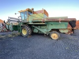 John Deere 7700 Combine with 216 Grain Head