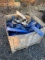 Crate of Blue Hose and a Valve