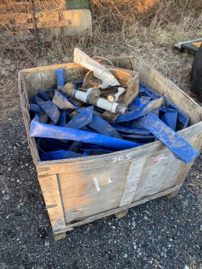 Crate of Blue Hose and a Valve