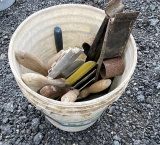 Bucket of Tile Trowels