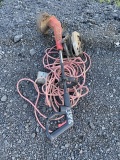 Weed Eater, Skill Saw, and Extension Chord