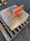 Pallet of orange rolls flagging tape