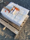 Pallet of White and Orange Spray Cans Marking Paint