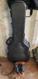 Guitar Gun Case, Suit Jacket and Binoculars