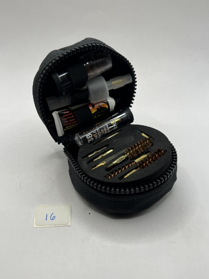 Small gun cleaning kit with case.