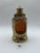 caseys lantern with some liquid avon bottle