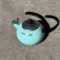 Teal Farberware tea kettle