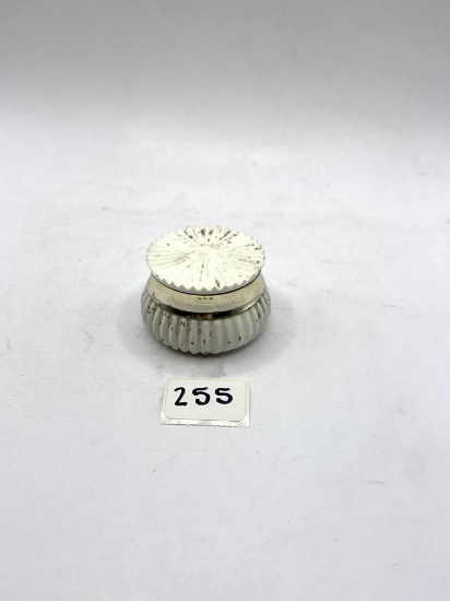 Small white Avon bottle