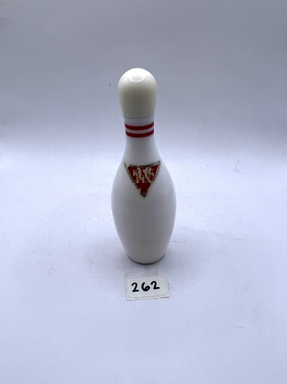 Bowling pin with some liquid Avon bottle