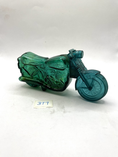 Super cycle with liquid Avon bottle