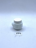 Small white Avon bottle