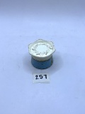 Small blue and white Avon bottle