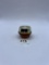 Small brown Avon bottle