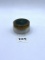 Clear with green lid Avon bottle