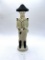 White soldier with some liquid Avon bottle