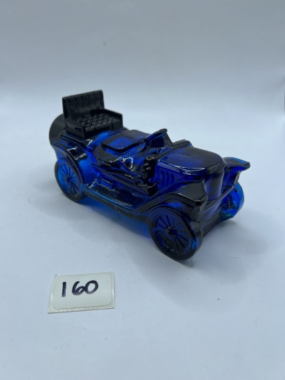 Stanley steamer with little liquid Avon bottle