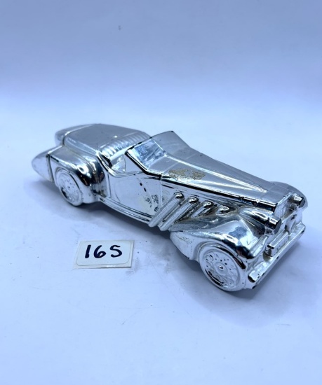 Silver Duesenberg Avon bottle