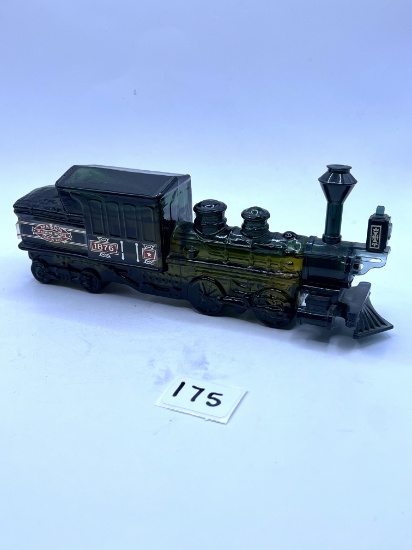 1876 centennial express with some liquid Avon bottle