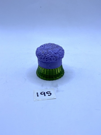 Small purple field flowers small crack in plastic top Avon bottle