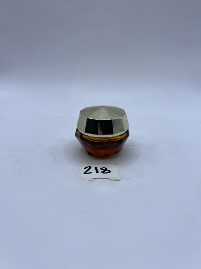 Small brown Avon bottle