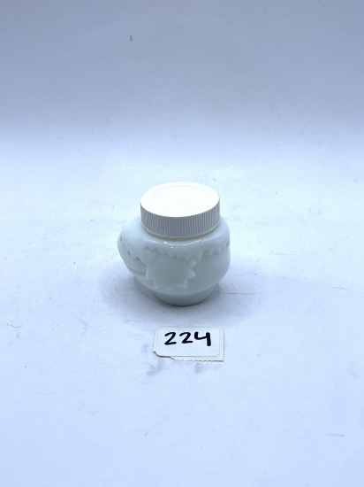 Small white Avon bottle