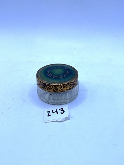 Clear with green lid Avon bottle